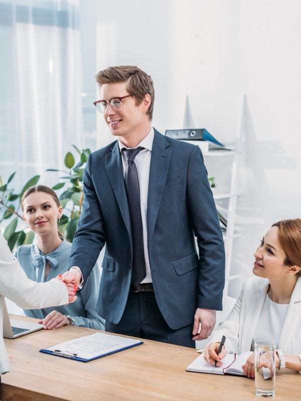 cheerful-man-in-glasses-shaking-hands-with-recruiter-on-job-interview.jpg cheerful-man-in-glasses-shaking-hands-with-recruiter-on-job-interview.jpg